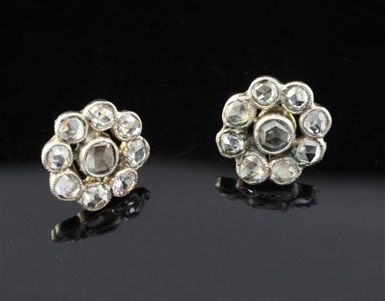 A pair of late 19th/early 20th century gold and silver rose cut diamond cluster earrings, 0.5in.